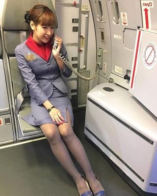 Asian Flight Attendants in Pantyhose Part