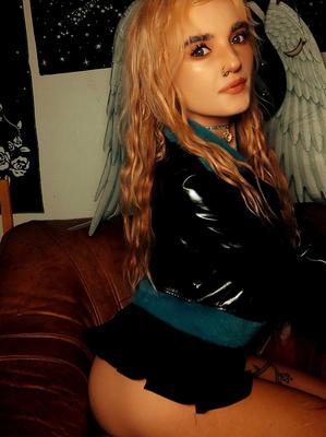 Blondie taking off her panties and bra. Wears a tiny skirt