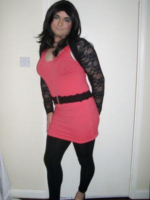 Marie Crossdresser in pink mini and seamless pantyhose