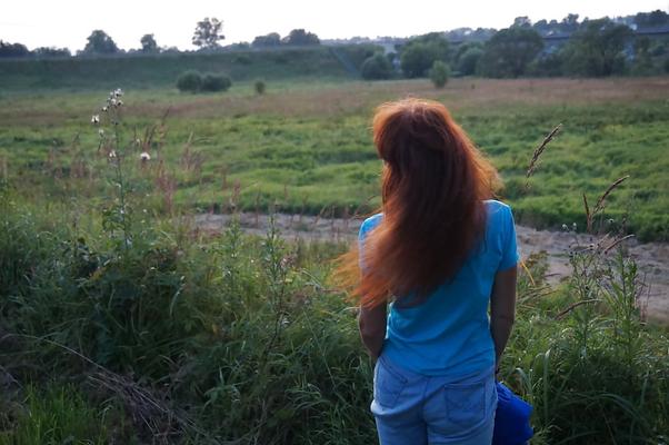 Flamehair in evening on the bridge