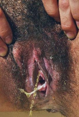 Pissing Over Her Stringy Pussy Discharge
