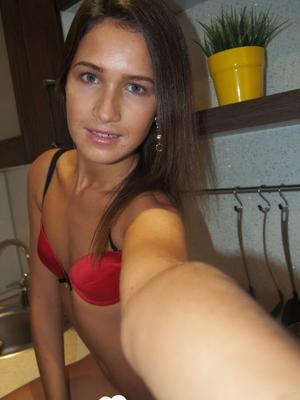 Hot brunette with small tits shows off