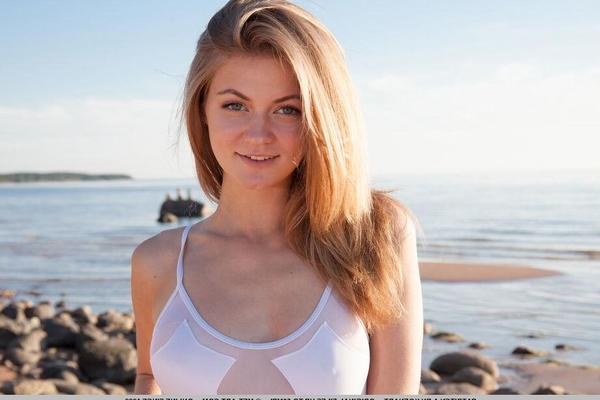 Pretty blonde Patritcy A gets totally nude on the beach in "Drease"