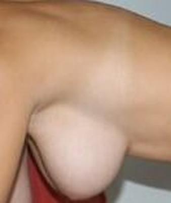 Busty brunette shows us the goods