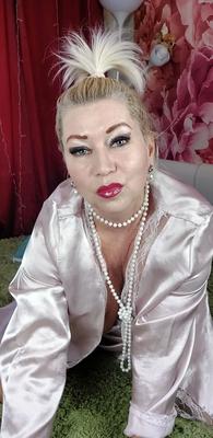 Charming mature slut shows off her big boobs and cunt ))