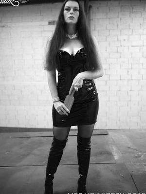 Black PVC dress, black pantyhose and overknee boots