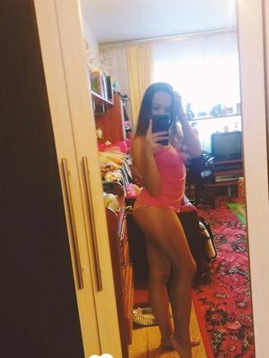 Hot girlfriend displaying her legs and ass