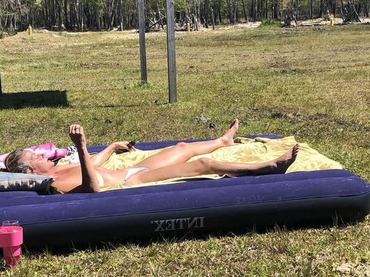 Leslie sexy ass sun tanning in the yard