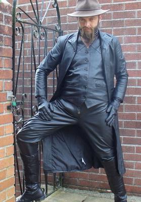 Leather Master outdoors in leather coat and boots