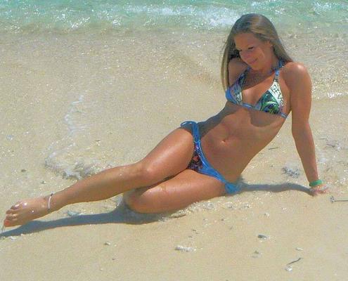 Sarah Takes On Tiny Blue String Bikini