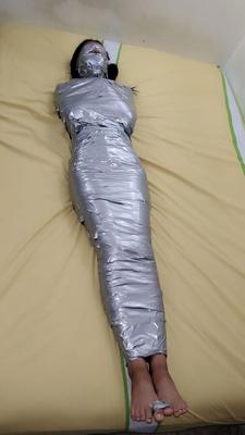 Young Girl Duct Tape Wrapped Like An Egyptian Mummy