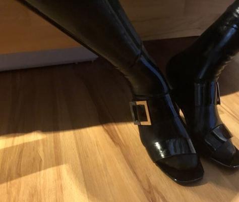 Latex and Dildos on Bed