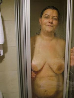 Boobs and butts against shower door
