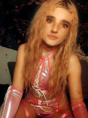 Being a treat in fishnet, thigh highs, pink cosplay