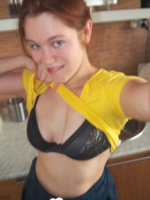 Cute redhead has no shame in showing tits