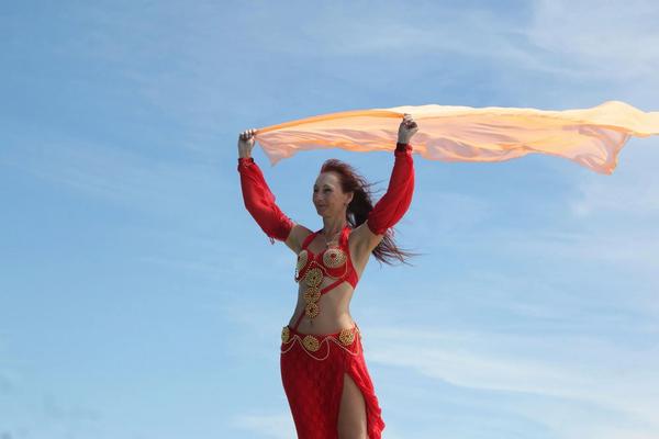 On top with an orange shawl - 50 Pics