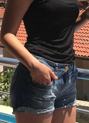 Turkish woman selling old clothes