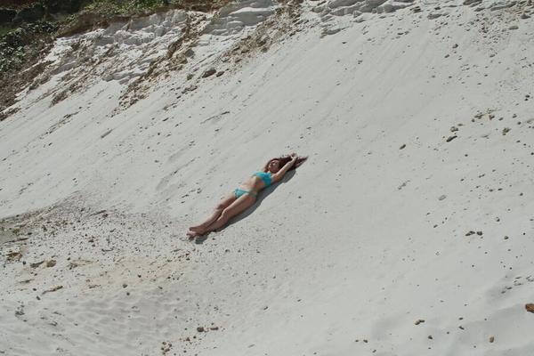 On White Sand in turquos bikini