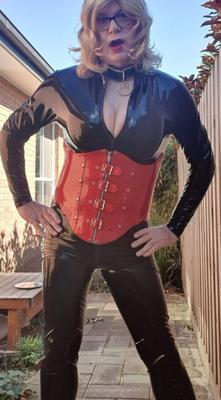 Rachel Wears a Catsuit and a Red Corset