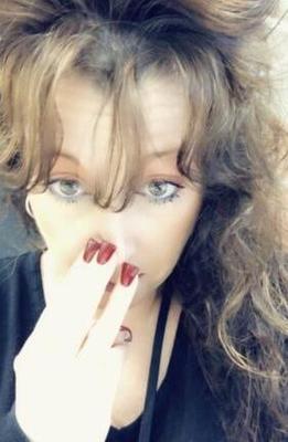 Sexy Milf With Big Hair.