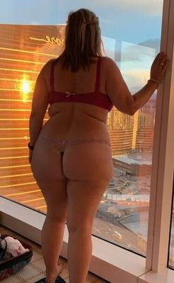 Matures standing in front of window