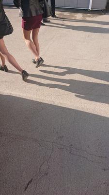 Two whores in pantyhose on the street
