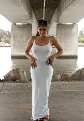 Exotic Girl Posing In Her White Dress