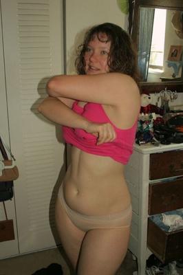 Pretty amateur Erika shows her hairy pussy