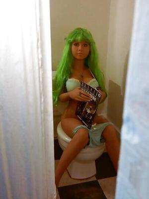 Nina on the crapper