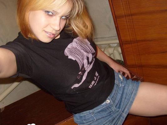 Horny babe shows off her red panties