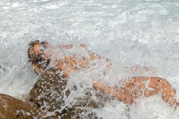 Naked in the surf