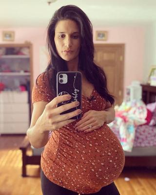 Hot mom Ashley with a huge twinbelly