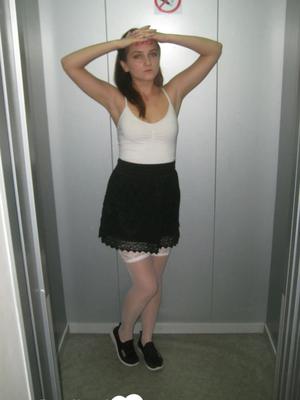 Extraordinary brunette in stockings displaying her pretty feet