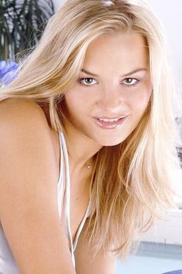 Blonde in crotchless pantyhose spreads