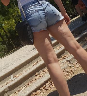 pretty ass brunette in mini shorts