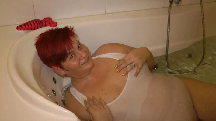 In the white SWIMSUIT in WHIRLPOOL
