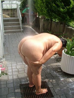 Taking a shower at the yard