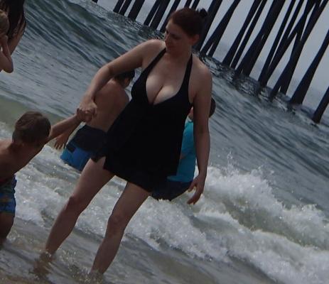 busty milf showing big cleavage