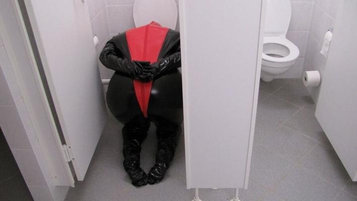Anna as a toilet in latex ...