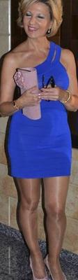 Blonde mature in blue dress