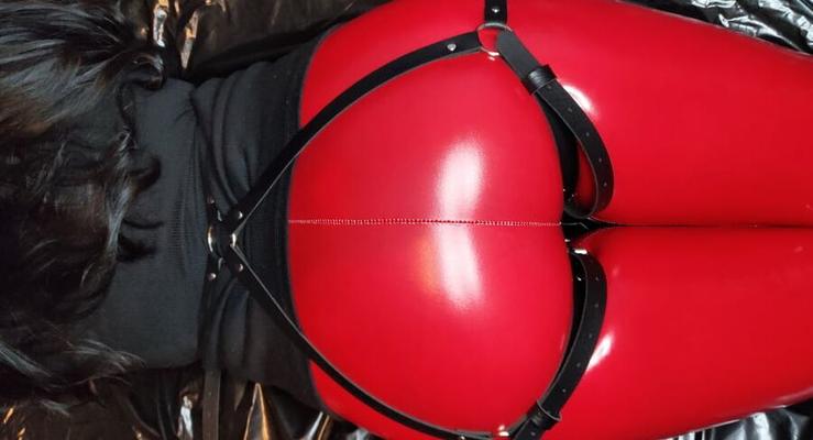 Ass in Red Leather Leggings
