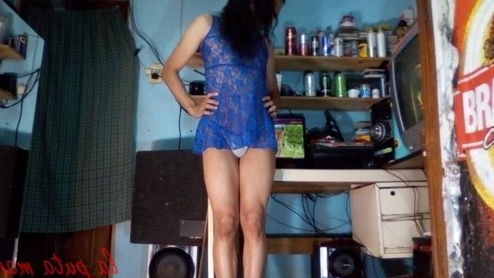 the whore maria wearing a blue dress