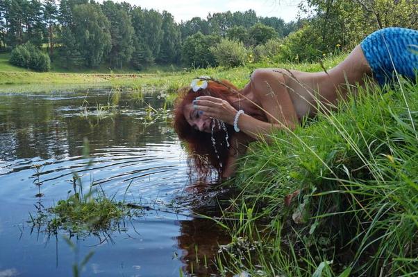 Mermaid plays with water