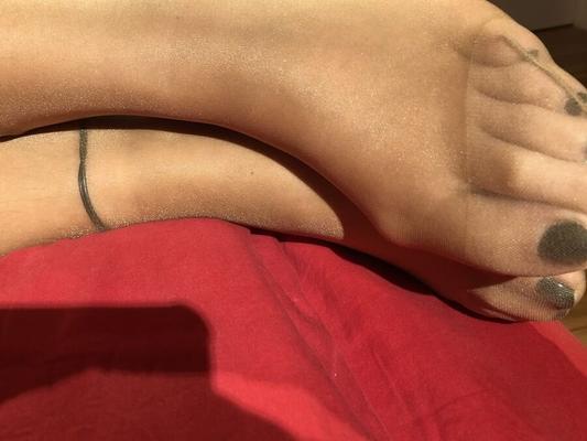 High Heels and Nylons on Bed