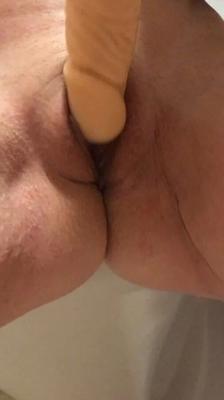 Playing with a dildo a little