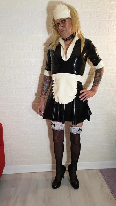 25P Latex Maid Charlotte With Domme Lisa.