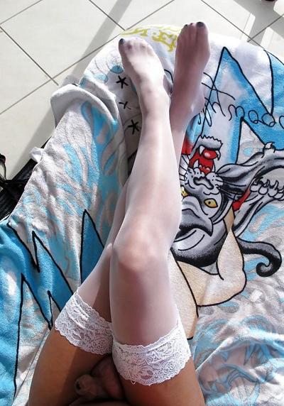 7P Sun bakeing in white lace top stockings !