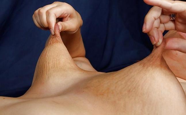 18P Girls pinching and pulling their nipples.