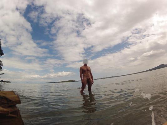 10P Naked, hard and stroking at the beach