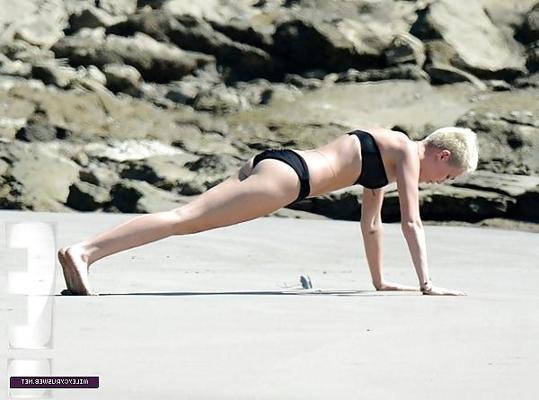 22P Miley Cyrus yoga at the beach 